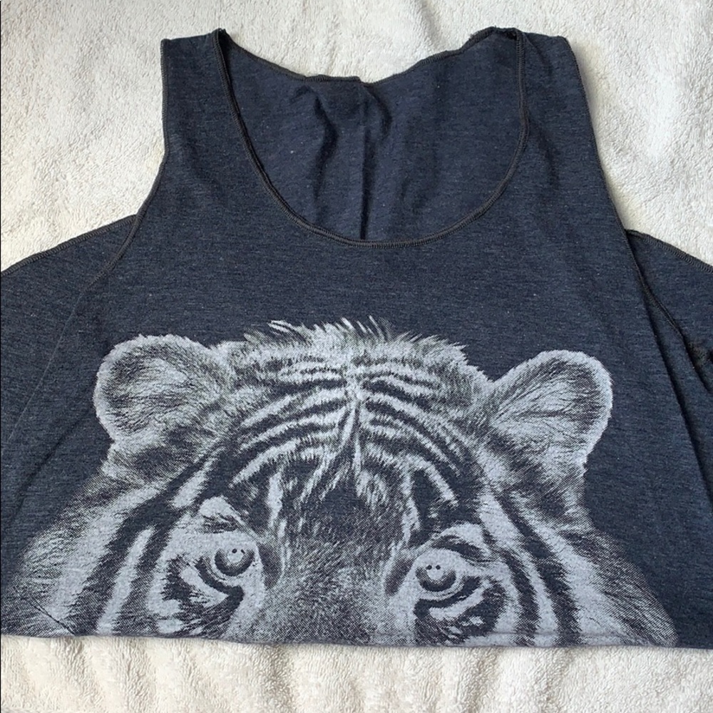 Cute tank with lion head detailing.
